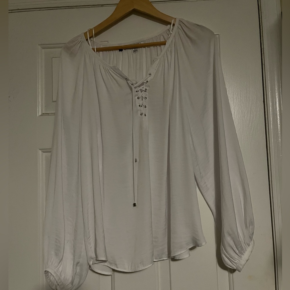 white silky puff sleeve top with lace up neckline
